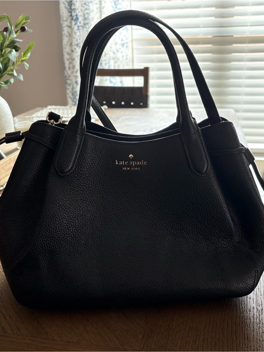 kate spade black pebbled leather satchel with gold logo accents